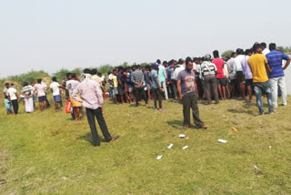 People gathered in the village at the pond at krishnapuram nalgonda