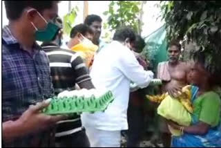 TDP leaders distributing essentials