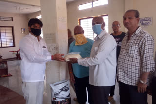 ssk social service workers distributes food for poor