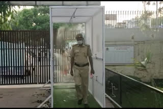 automatic sanitizer machine is installed at rajouri garden police station in delhi