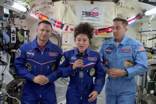 US astronaut Jessica Meir accompanied by Andrew Morgan and Chris Cassidy