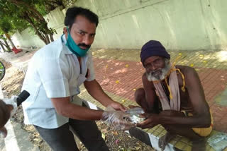 Distributing food to the destitute and homeless in vizag