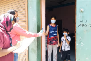 Municipal transporting masks and sanitizers to people's homes in korba