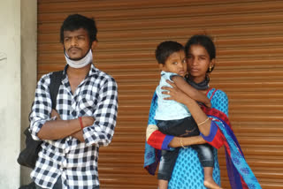 Couple walking with a baby girl from Coimbatore to Tirupur