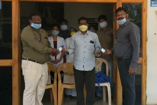 masks, sanitizers distribution in narasabbapeta