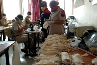 delhi police women constable making mask after duty hour in dwarka delhi