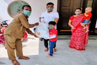 mla gadari kishore distributed fruits too sanitation workers