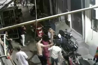 goons beaten mother and son in tughlakabad delhi incident captured in cctv