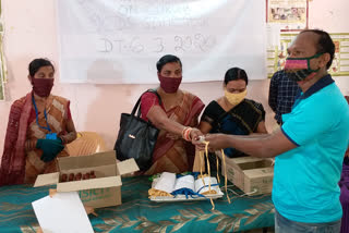 mask and sanitizer distributed in sonepur