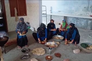 Anganwadi Worker worth with black Scarf