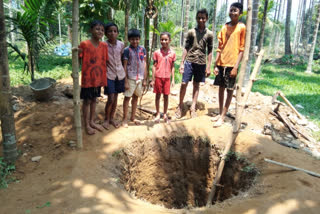 Children dig well to obtain drinking water amid COVID-19 crisis