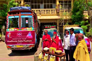 ganapati sachidananda swamy distributed daily essentials to poor at mysore