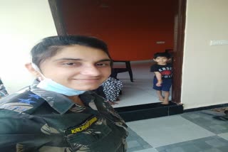 Sub Inspector working away from son