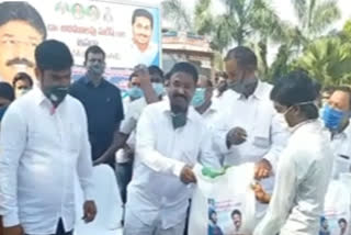 minister aadimulapu suresh distributed daily needs to people at yerragodapalem prakasam district