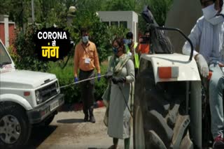 Counselor Nikita Sharma sanitizes the police station during the corona