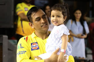 MS Dhoni and his daughter Ziva enjoying a bike ride