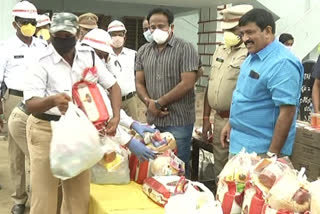 Distribution of sanitizers to police in Kakinada