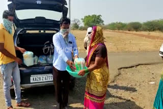 A group of youths distributed kits of essentials to people who returned to the village