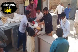 rwa distributing ration in begum pur