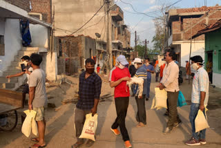 Relief materials are being delivered to the needy by social workers