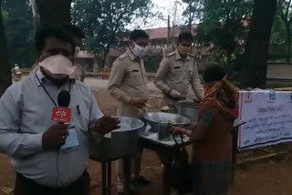 Police feeding poor people during