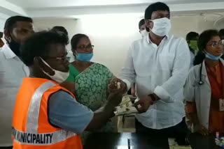 aayush medicine distributing to sanitary workers by narsipatnam mla