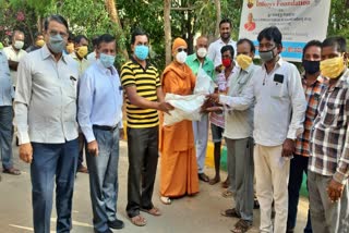 Distribution of ration kit for 45 photographers at Pavagada