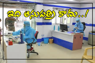 bank-employees-in-nizamabad-are-doing-their-jobs-with-ppe-kits