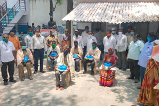 felicitation of sanitation workers at komarolu