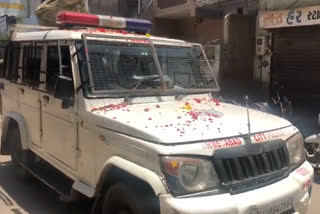 police welcomed by people with flower