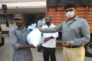 groceries kits are distributed by the industrialists to the villagers in sangareddy