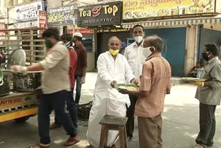 Distribution of meals to the poor in Guntur