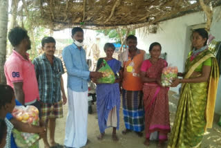 Distribution of rice and vegetables to poor people in thamballapalli