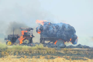 Fire to a tractor carrying paddy grass in Raichur