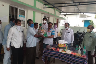 distribution of essentials to electrical workers at amadalavalasa in srikakulam