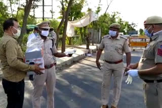 kit distributed to policemen giving duty at picket in dwarka in delhi during lockdown