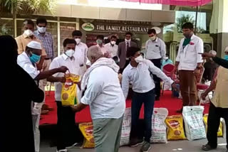 hotel entrepreneur distributes groceries to 2,600 poor families