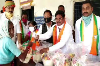 mp-soyam-baburao-distributed-food-items-at-rebbena-mandal-kumaram-bheem-asifabad-district