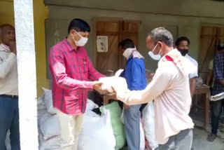 Minister Bhabesh Kalita distributed food at Apollo mill at Rangia