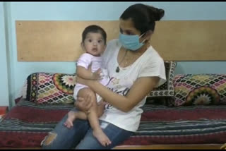 Samantha with her daughter