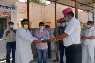 PPE kit and sanitizer distributed , पीपीई किट और सैनिटाइजर वितरित