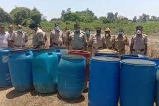 police raid on illegal liquor making spot