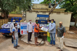 goods distributes to sanitatio   workekrks in west godavari dst by  gas agency