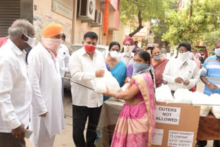 mla muta gopal groceries distribution in hyerabad