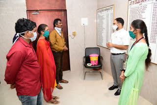 karimnagar  collector appreciates the inventions of covid prevention sensors