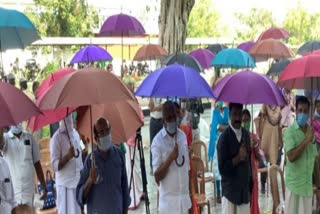 umbrellas mandatory for social distancing