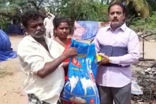 Providing essential necessities to victims of hut burn in mopidevi