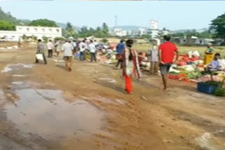 sudden rainfall in yelamanchili on Wednesday leads to loss of vegetable market business people