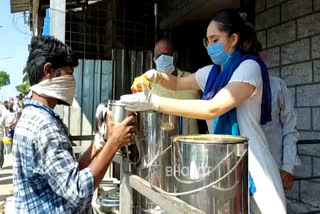 Actress Ragini distribute the food kit to helpless