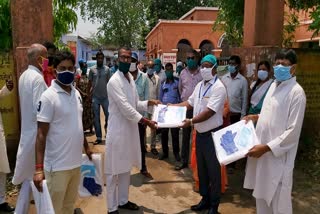 Distribution of PPE kits and masks to doctors and medical personnel at bokaro